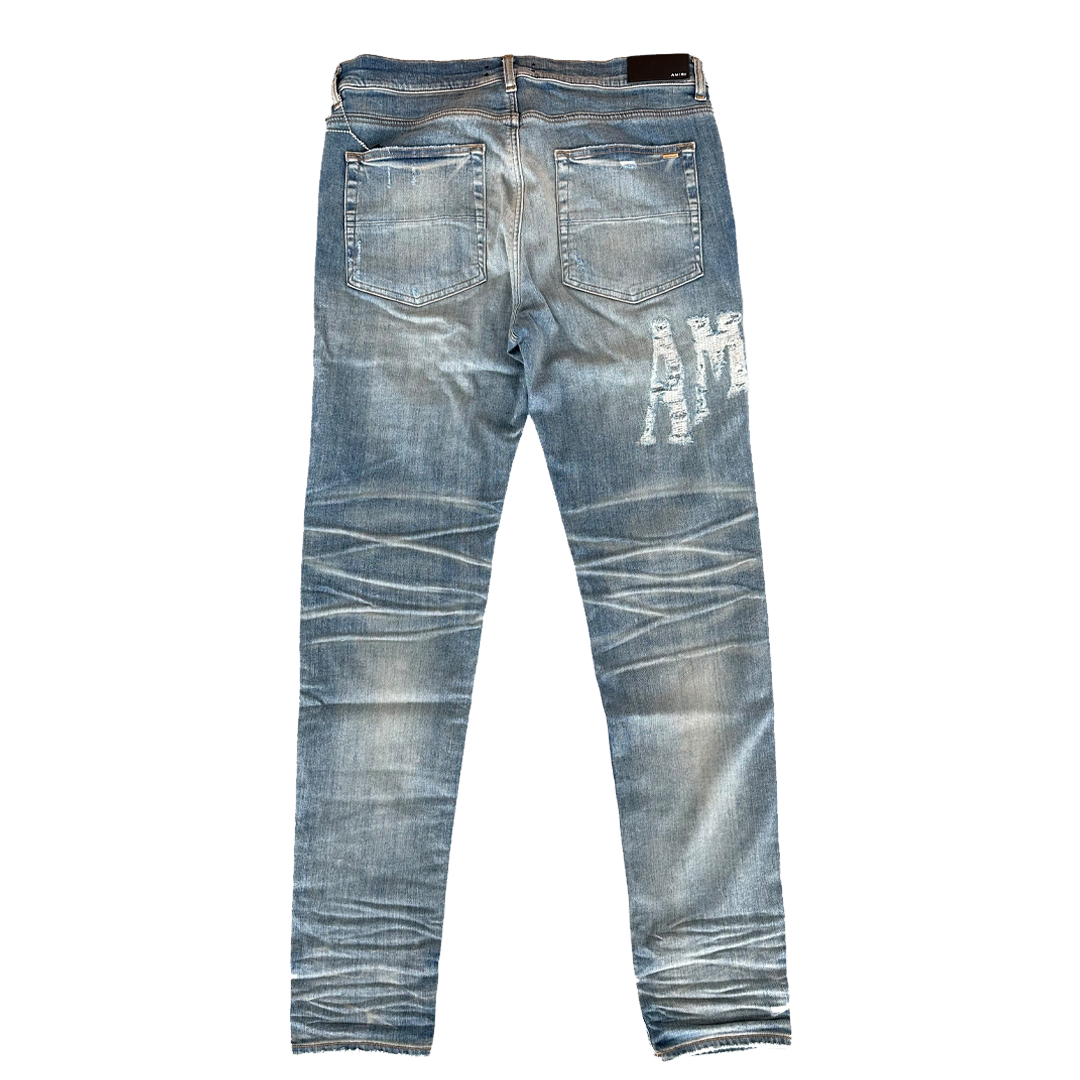 Amiri Distressed Logo Jeans Clay Indigo