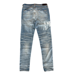 Amiri Distressed Logo Jeans Clay Indigo